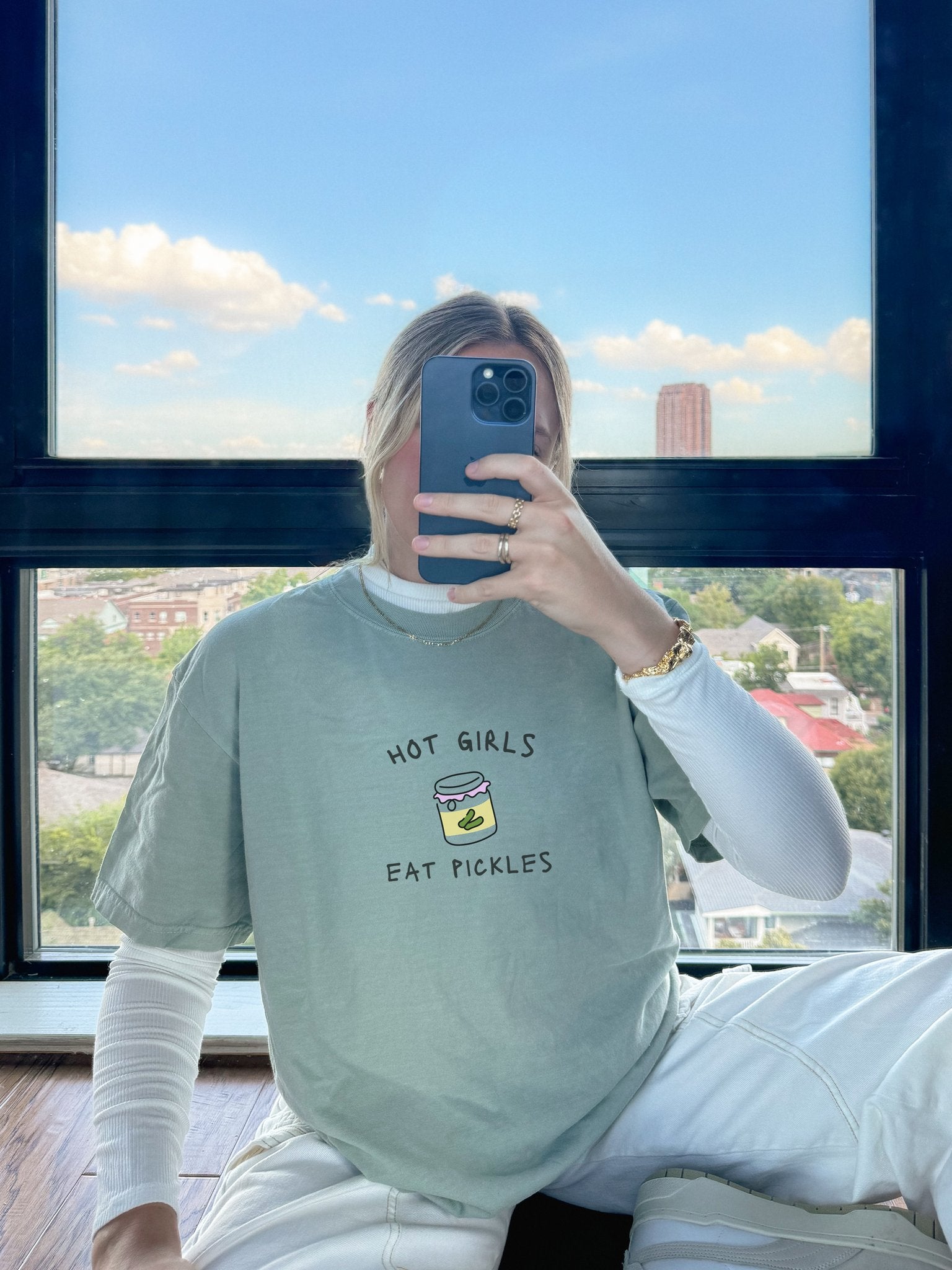 T-shirt with 'Hot Girls Eat Pickles' text and cute pickle jar illustration in pink and yellow