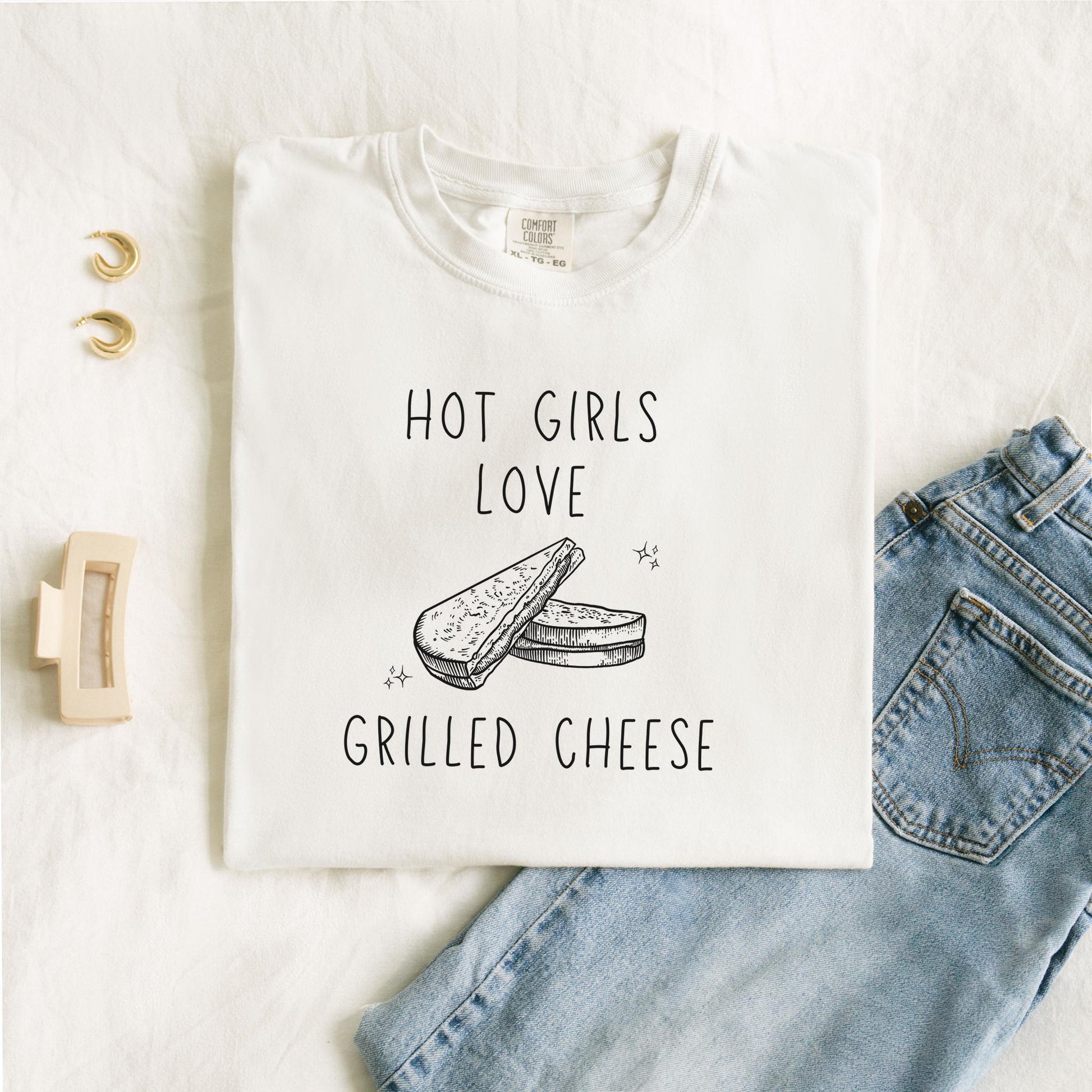 T-shirt with hand-drawn grilled cheese sandwich illustration and text reading Hot Girls Love Grilled Cheese