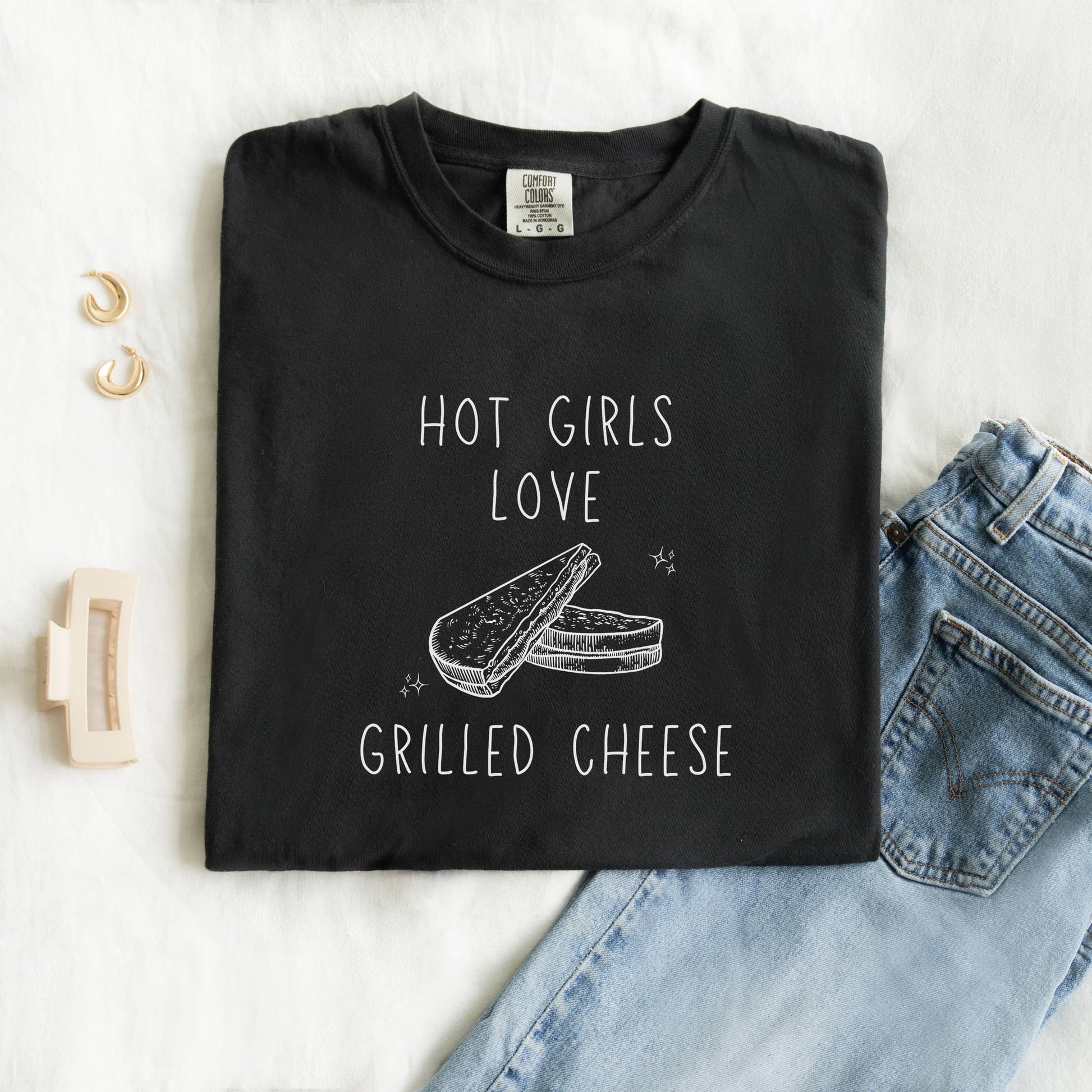 T-shirt with hand-drawn grilled cheese sandwich illustration and text reading Hot Girls Love Grilled Cheese