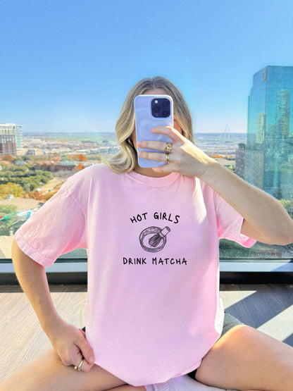 T-shirt with 'Hot Girls Drink Matcha' text and hand-drawn matcha bowl with whisk illustration