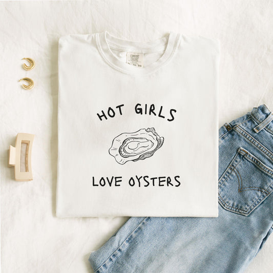 T-shirt with 'Hot Girls Love Oysters' text and hand-drawn black oyster shell illustration