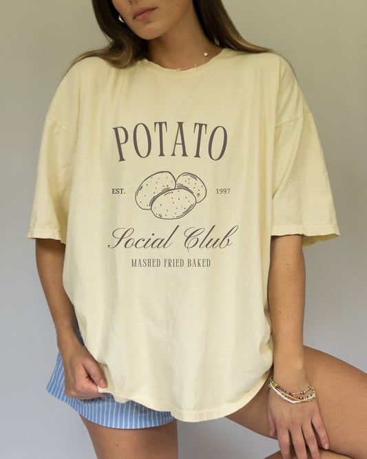 T-shirt with vintage Potato Social Club design featuring hand-drawn potatoes and brown text