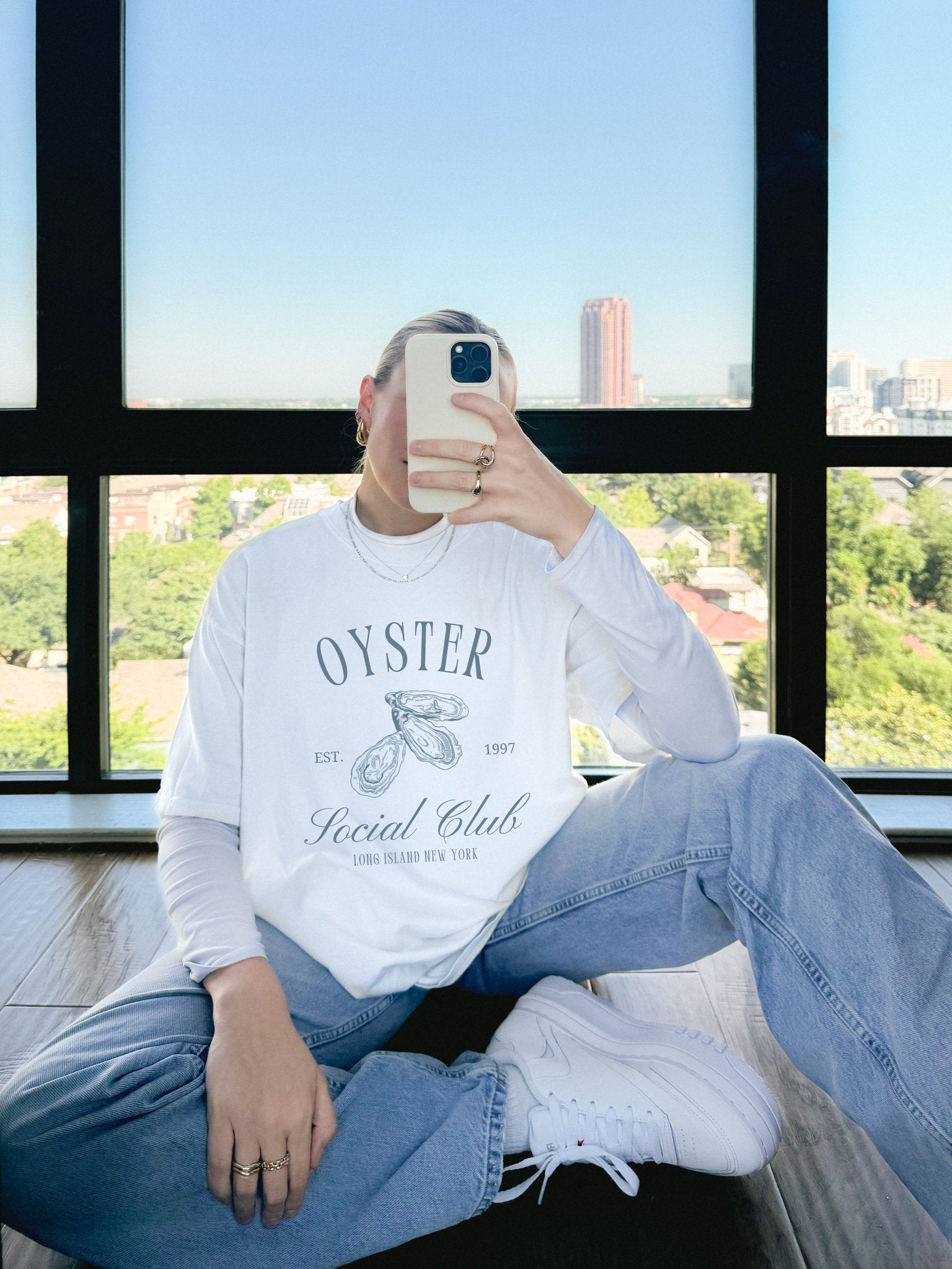 T-shirt with vintage oyster social club design featuring three detailed oyster illustrations