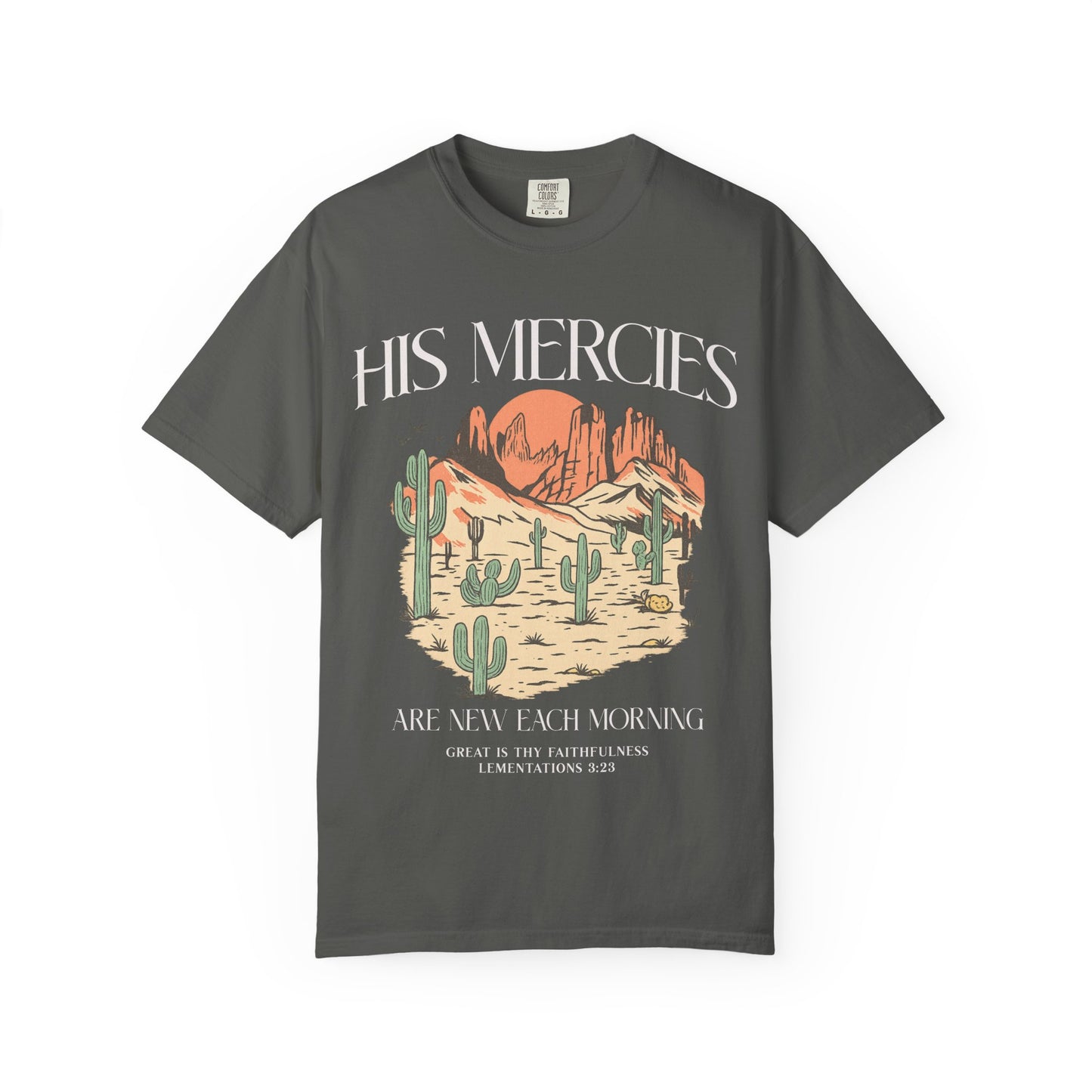 T-shirt with desert landscape design featuring cacti, mountains, and 'His Mercies Are New Each Morning' text with Lamentations 3:23 bible verse