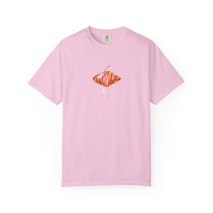 T-shirt with watercolor croissant design featuring golden brown pastry with pink ribbon bow