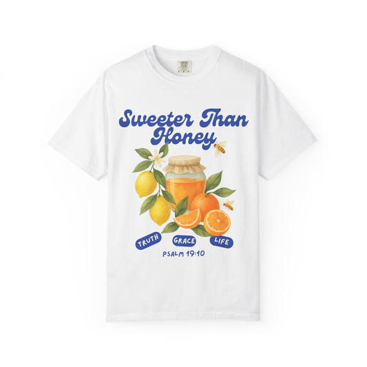Christian t-shirt with Sweeter Than Honey Psalm 19:10 design featuring watercolor honey jar, citrus fruits, and bees