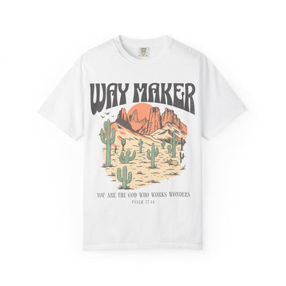 T-shirt with Way Maker text, desert landscape featuring cacti, mountains, and orange sunset with Psalm 77:14 verse