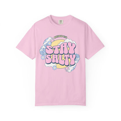 T-shirt with wavy font Stay Salty Matthew 5:13 text in pink bubble letters with ocean waves and flowers