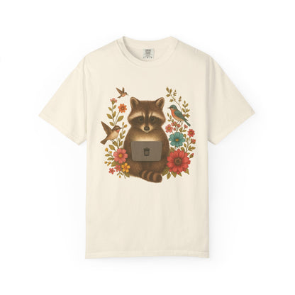 T-shirt with vintage-style raccoon illustration surrounded by colorful wildflowers and birds