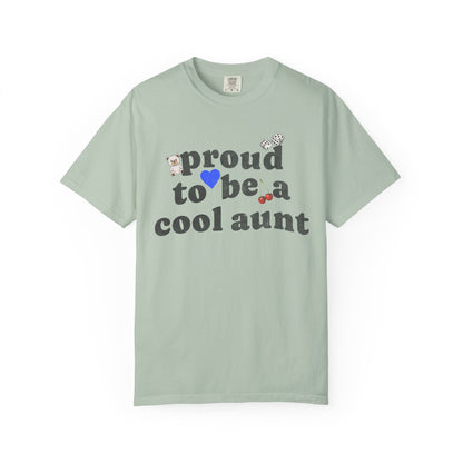 T-shirt with retro distressed text 'proud to be a cool aunt' decorated with teddy bear, blue heart, dice, and cherries