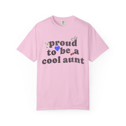 T-shirt with retro distressed text 'proud to be a cool aunt' decorated with teddy bear, blue heart, dice, and cherries