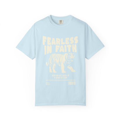 A t-shirt featuring 'Fearless In Faith' text design in elegant cream colored typography