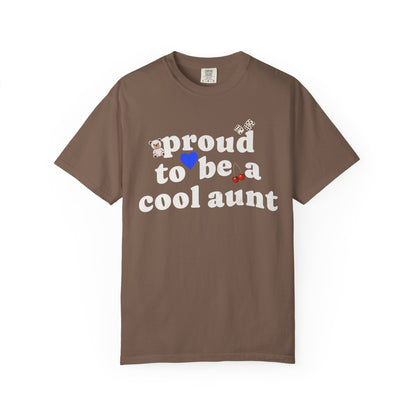 T-shirt with retro distressed text 'proud to be a cool aunt' decorated with teddy bear, blue heart, dice, and cherries