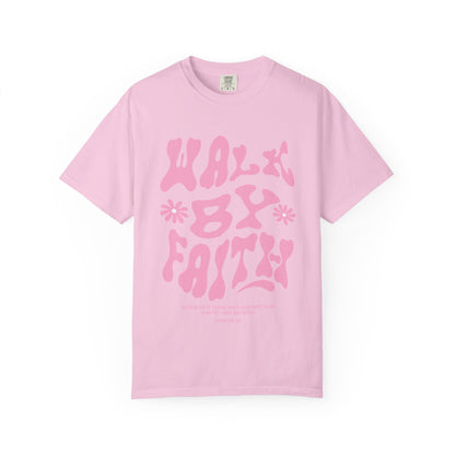 T-shirt with pink wavy font saying Walk By Faith with flowers and John 20:29 Bible verse