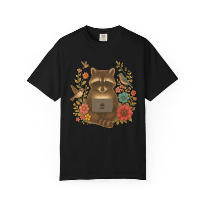 T-shirt with vintage-style raccoon illustration surrounded by colorful wildflowers and birds