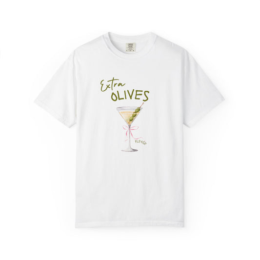T-shirt design with martini glass, green olives, and pink bow saying Extra Olives Please