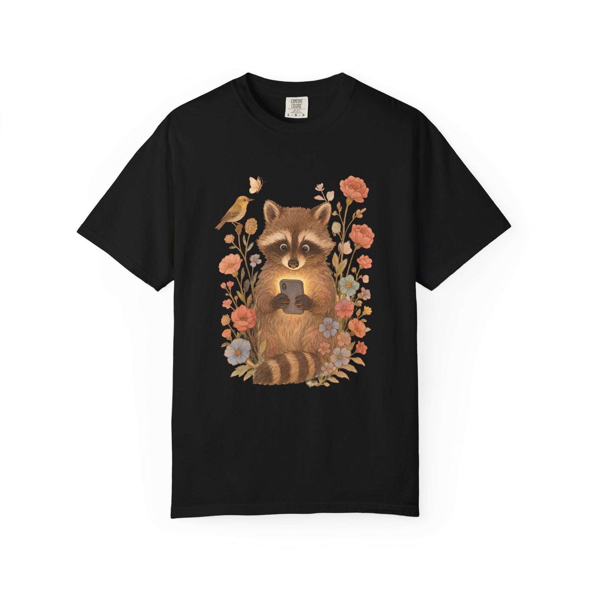 T-shirt with cute raccoon holding smartphone surrounded by coral and blue wildflowers