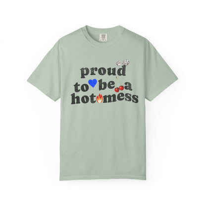 T-shirt with distressed black text reading 'proud to be a hot mess' decorated with dice, blue heart, cherries, and flame graphics