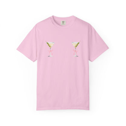 T-shirt design with two martini glasses containing olives and pink bow details creating a humorous cocktail theme