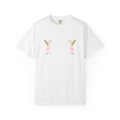 T-shirt design with two martini glasses containing olives and pink bow details creating a humorous cocktail theme