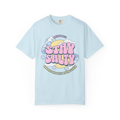 Christian t-shirt with pink 'Stay Salty' text, Matthew 5:13 verse, ocean waves and daisy flowers