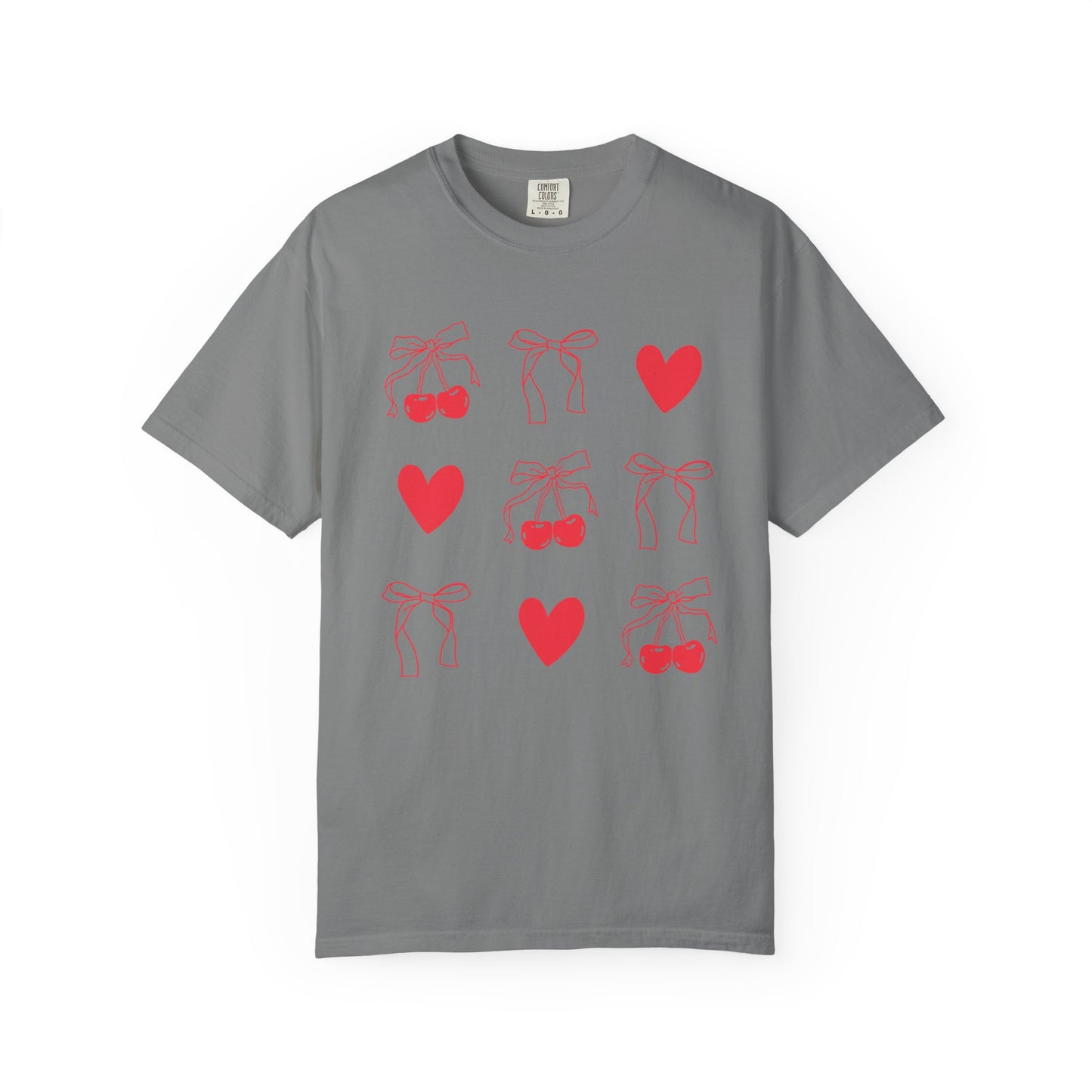 T-shirt with red cherry and bow pattern featuring hearts and ribbon bow designs
