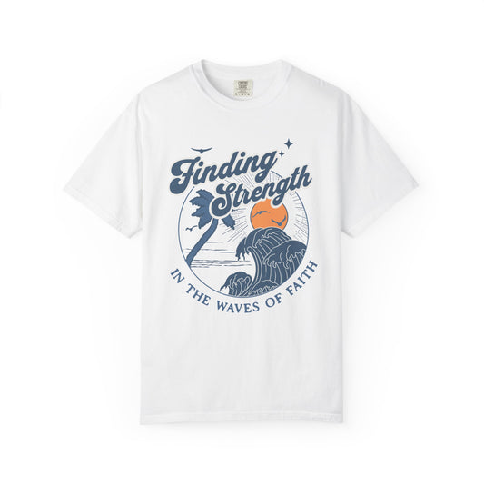 T-shirt with retro Christian design featuring palm tree, sunset, and ocean waves with Finding Strength text