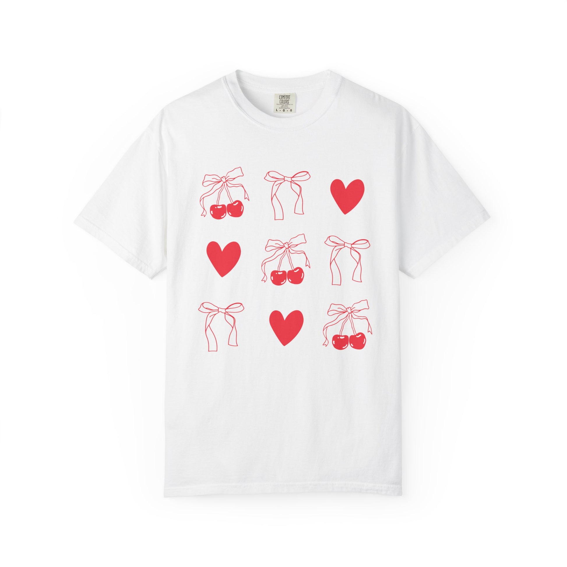 T-shirt with red cherry and bow pattern featuring hearts and ribbon bow designs