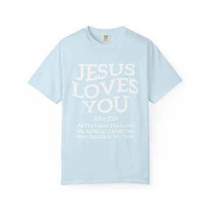 Black text design on t-shirt reading Jesus Loves You with John 15:9 Bible verse