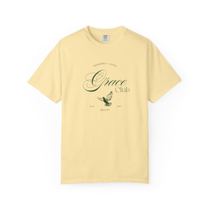 T-shirt with Grace Club text, dove symbol, and Redeemed + Loved message in elegant green design