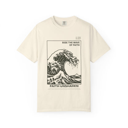 T-shirt with ocean wave design featuring 'Ride The Wave of Faith' and 'Faith Unshaken' text