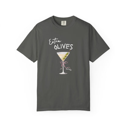 T-shirt design with martini glass, green olives, and pink bow saying Extra Olives Please